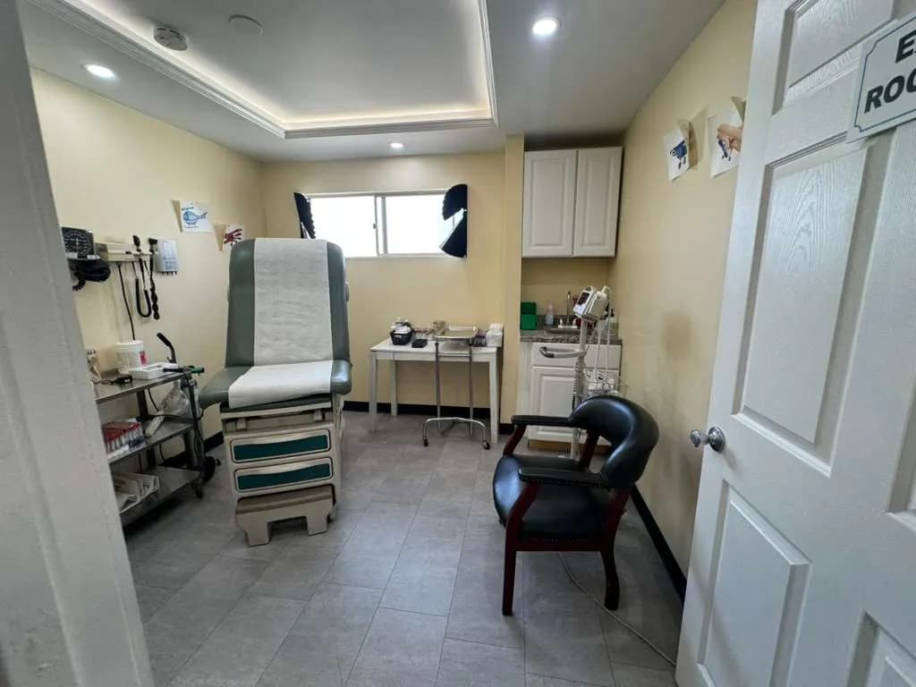 Walk-in clinic exam room with vitals monitor El Cajon